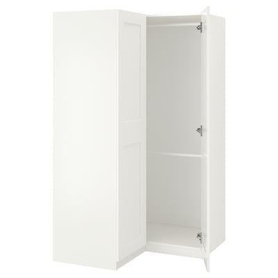 Armari blanc Ikea PAX. Unitat alta, rectangular, cantonera. Dues portes batents, obertes a la vista.
