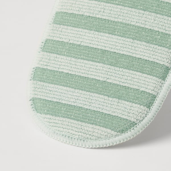 Primer pla del coixinet de microfibra PEPPRIG, suau, texturitzat amb ratlles verdes i blanques, ideal per a una neteja suau.