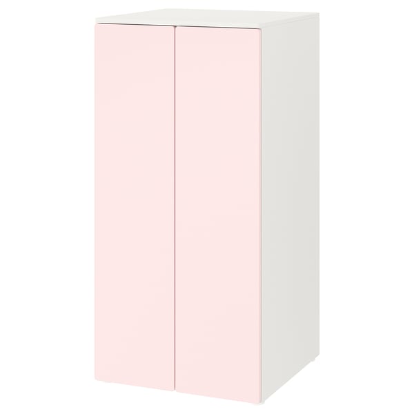 Un armari SMÅSTAD en blanc i rosa clar, amb dues portes de tancament suau.
