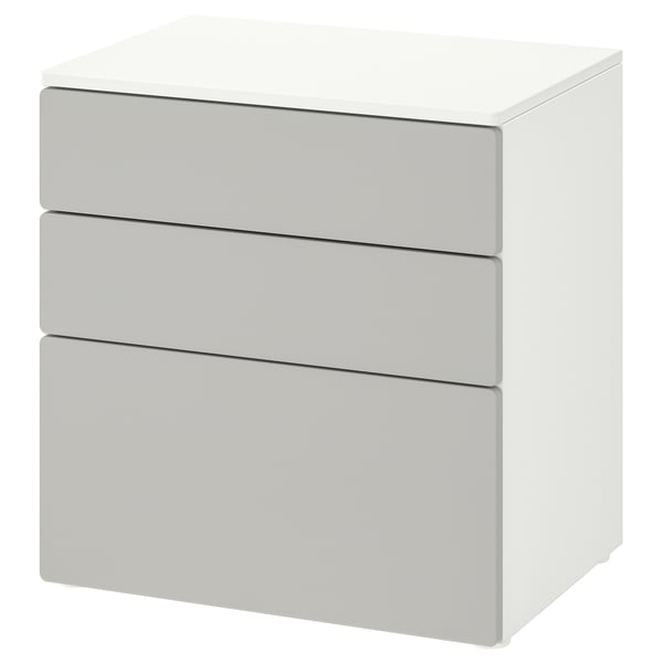 Una cofre SMÅSTAD blanca, ideal per a habitacions infantils, amb un disseny minimalista i estalvi d'espai.