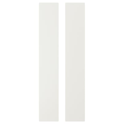 Dues caixes rectangulars blanques, de disseny senzill i net, ideals per a l'emmagatzematge.