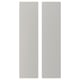 Dues portes altes, rectangulars, de color gris, de color pastel, fetes de taulers de fibra.