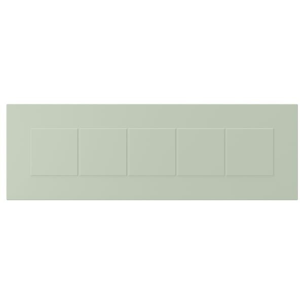 Panell rectangular verd amb divisors ranurats, que representa una façana STENSUND feta de tauler de fibra i pintura.