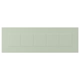 Panell rectangular verd amb divisors ranurats, que representa una façana STENSUND feta de tauler de fibra i pintura.