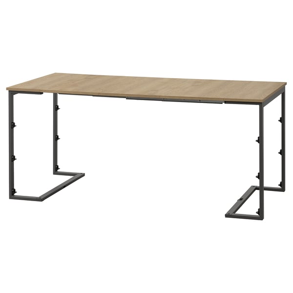 taula de menjador TRÄKUMLA; fusta clara, metall fosc; rectangular; Disseny extensible.