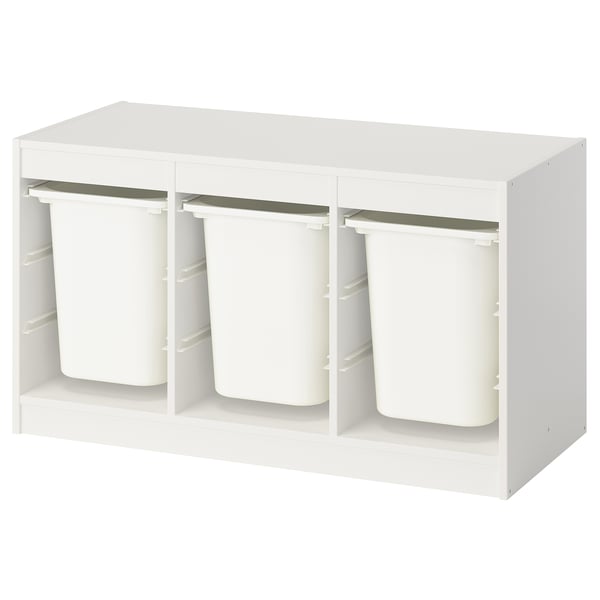 Moble d'emmagatzematge infantil blanc Ikea TROFAST amb tres contenidors quadrats.
