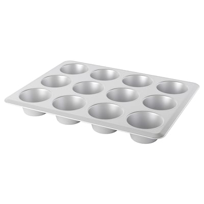 Llauna VARDAGEN: paella de magdalenes d'alumini platejat. Dotze cavitats rodones, superfície anoditzada duradora.