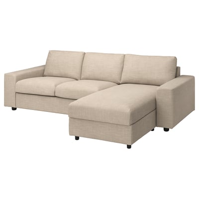 Un sofà seccional VIMLE beix amb chaise longue a la dreta, amb un disseny modern i net.