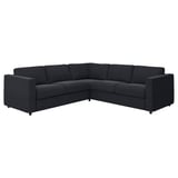 Sofà seccional VIMLE negre, disseny modern amb teixit fosc, disposició cantonada en forma de L, garantia de 10 anys.