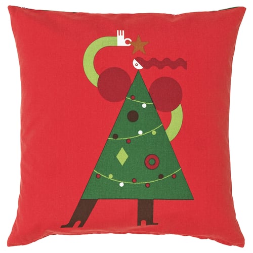 Coixí quadrat vermell amb disseny d'arbre de Nadal verd; cara blanca, ornaments marrons, decoracions de colors.