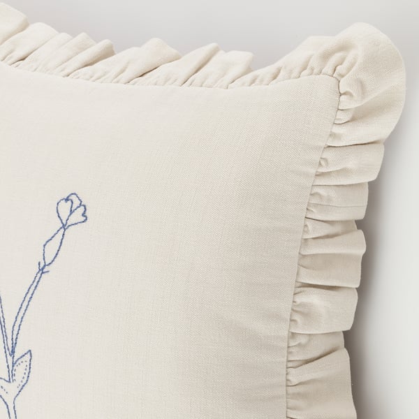 Decorative cushion cover with hand-embroidered flowers, cream with ruffled edges, high-quality cotton.