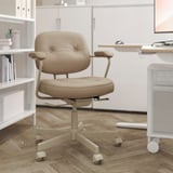 Modern home office: beige leather ergonomic chair with adjustable armrests, casters, in minimalist white room.