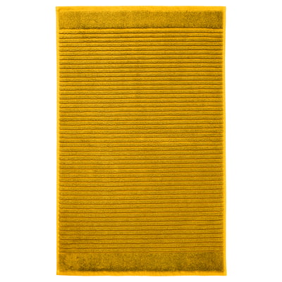 Bright yellow, rectangular, textured cotton bath mat.