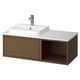 A modern, minimalist floating bathroom vanity in brown oak with a white marble countertop and open storage.