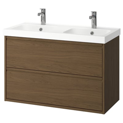 Modern dual sink vanity with wooden finish, minimalist handles, white ceramic basins, and chrome faucets.