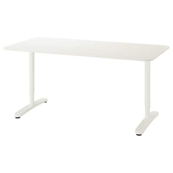 A white BEKANT desk with a rectangular top and adjustable legs.
