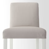 Modern bar stool with cushioned seat and back, beige upholstery, clean lines, sturdy design.