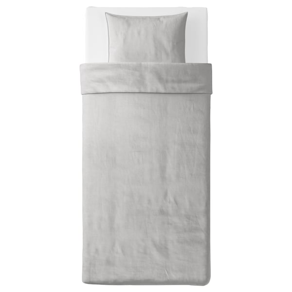 A neatly made bed with the BERGPALM duvet cover set in light gray with classic striped patterns, featuring soft 100% cotton material.