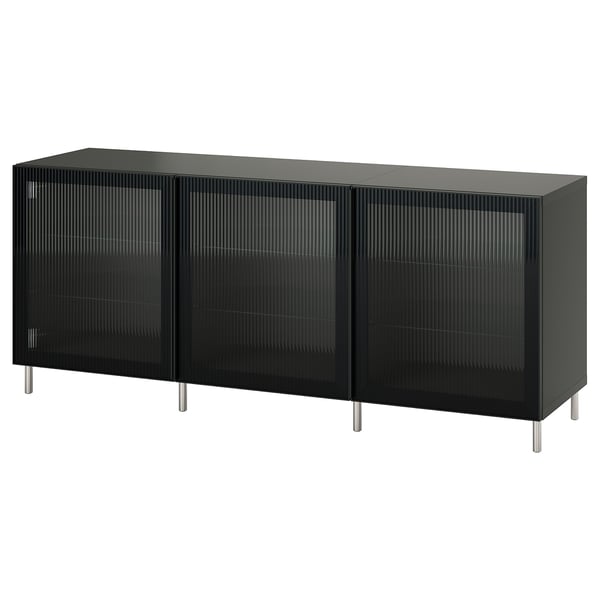 Black BESTÅ storage unit, rectangular, four glass doors, metal legs.