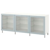 This image shows a white BESTÅ sideboard with three glass doors and metal legs. It adjustable shelves for versatile storage.