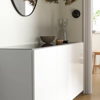 BESTÅ glass top panel in black, rectangular, sleek design, larger than decorative items.