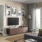 Modern living room with BESTÅ tv unit, adjustable shelves, and natural light from large window.