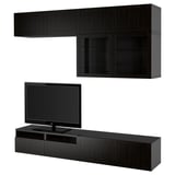 Modern black entertainment center with wall and base units, housing tv, with sleek design and storage spaces.