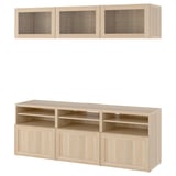 BESTÅ light oak storage unit with glass doors and shelves, modern design.