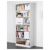 White BILLY bookshelf with multiple shelves filled with books and storage boxes, anchored to wall.