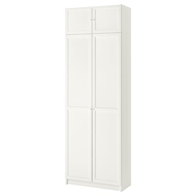 White BILLY bookcase with 4 adjustable shelves behind double doors.