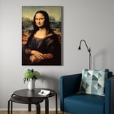 BJÖRKSTA canvas on grey wall with table, flowers, chair, and lamp in cozy space.