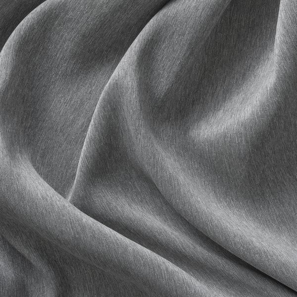 Close-up of smooth, textured, gray curtains, showcasing high-quality fabric for privacy and light blocking.