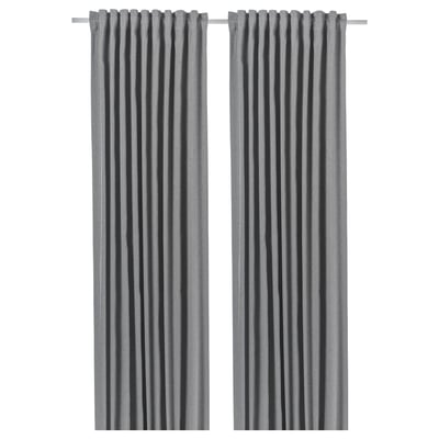 Two gray room-darkening curtains hang side by side, designed to block light and provide privacy, made from recycled polyester.