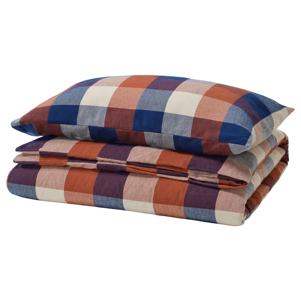 This image shows a folded red, blue, and white checkered BLÅSENAP flannel duvet cover set made from 100% cotton.