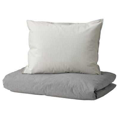 A grey BLÅVINDA duvet cover set with a striped pillowcase, made of 100% cotton.