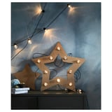 Cardboard star light by BLÖTSNÖ, warm bulbs, decorative wall art, cozy room decor.