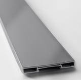 Close-up of sleek, smooth-grey plastic plinth, showing high-quality, clean finish.