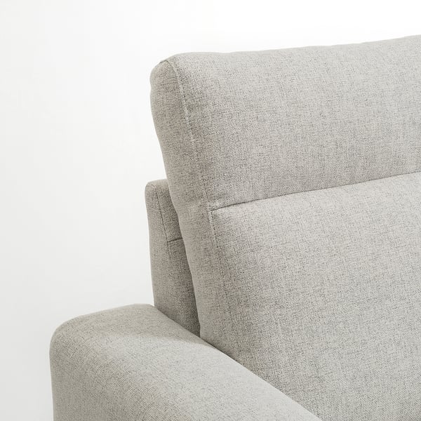 Close-up of modern light gray sofa, smooth fabric, cushioned backrest and armrest, clean design.