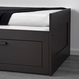 Modern black daybed with large storage drawers. Easily converts to a double bed by pulling out the base.