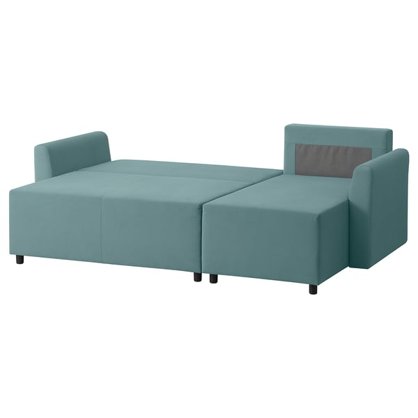 A turquoise BRISSUND sofa bed with a chaise longue, perfect for relaxing and sleeping, featuring a modern, clean design with a 10-year guarantee.