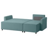 A turquoise BRISSUND sofa bed with a chaise longue, perfect for relaxing and sleeping, featuring a modern, clean design with a 10-year guarantee.
