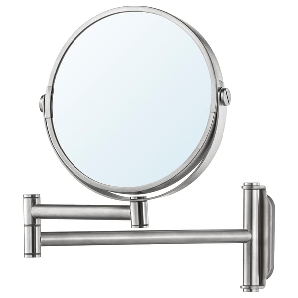 A BROGRUND magnifying mirror with a sleek, stainless steel design. Circular mirror on an adjustable arm.