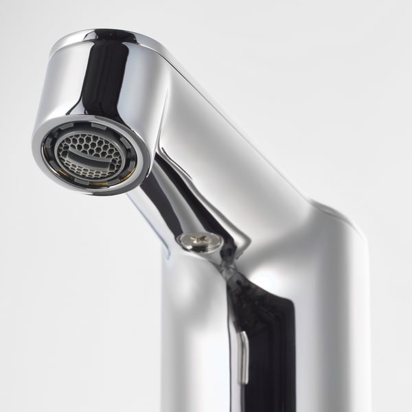 Modern chrome faucet with sensitive touch-on technology, showcasing sleek design and hygienic functionality.