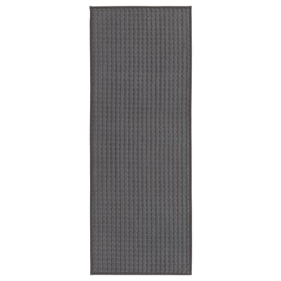 A grey rectangular BRYNDUM anti-slip kitchen mat, featuring a textured surface and recycled polyester material.