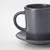 Grey mug on saucer