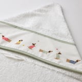 Fluffy white baby towel with cute dog prints, green trim, and hood. High-quality material, soft and absorbent.