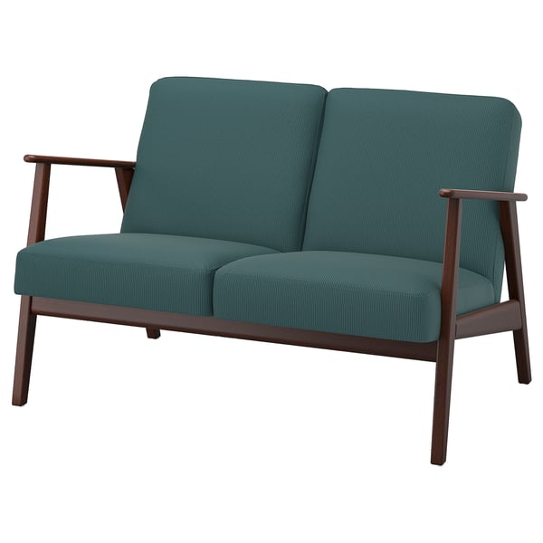 Vintage-style teal sofa with dark wood frame and angled back.