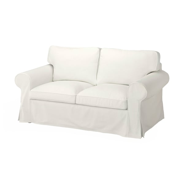 A white EKTORP two-seat sofa with rolled arms and a loose cover.