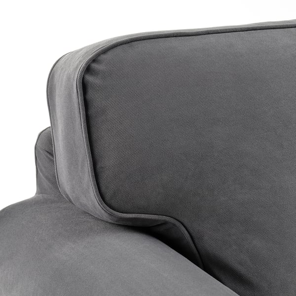 A close-up of a gray upholstered sofas armrest and cushion showcasing smooth, thick fabric and sturdy design.