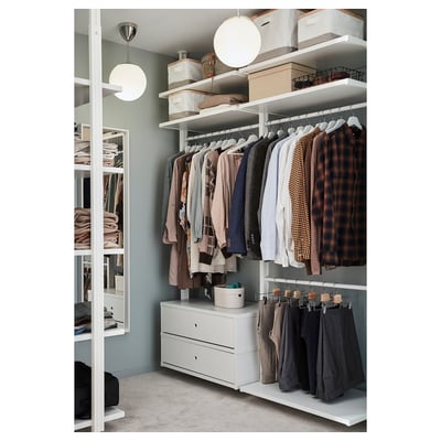 A white ELVARLI storage system with shelves, drawers, and a clothes rail.
